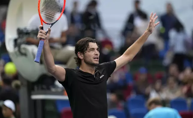 Taylor Fritz of the United States celebrates after defeating David Goffin of Belgium in the men's singles quarterfinals match of the Shanghai Masters tennis tournament at Qizhong Forest Sports City Tennis Center in Shanghai, China, Friday, Oct. 11, 2024. (AP Photo/Andy Wong)