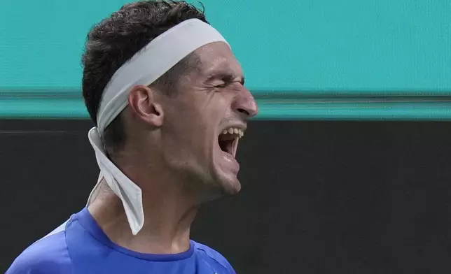 Terence Atmane of France reacts during the men's singles second round match against Taylor Fritz of the United States in the Shanghai Masters tennis tournament at Qizhong Forest Sports City Tennis Center in Shanghai, China, Monday, Oct. 7, 2024. (AP Photo/Andy Wong)