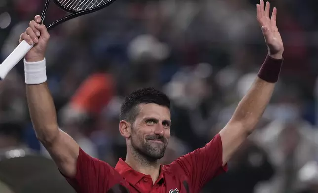 Novak Djokovic of Serbia celebrates after defeating Jake Mensik of the Czech Republic in the men's singles quarterfinals match of the Shanghai Masters tennis tournament at Qizhong Forest Sports City Tennis Center in Shanghai, China, Friday, Oct. 11, 2024. (AP Photo/Andy Wong)