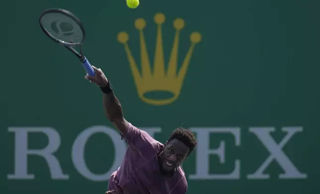 Gael Monfils of France serves against his compatriot Ugo Humbert during the men's singles third round match in the Shanghai Masters tennis tournament at Qizhong Forest Sports City Tennis Center in Shanghai, China (AP Photo/Andy Wong)