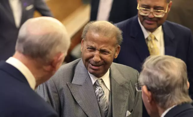 Simon Bouie meets well wishers after a hearing where his record was cleared after he was arrested in 1960 for sitting at an all-white South Carolina lunch counter on Friday, Oct. 25, 2024, in Columbia, S.C. (AP Photo/Jeffrey Collins)