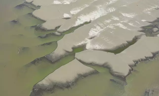 Signs of drought are visible on the Amazon River, in Santa Sofia, near Leticia, Colombia, Sunday, Oct. 20, 2024. (AP Photo/Ivan Valencia)