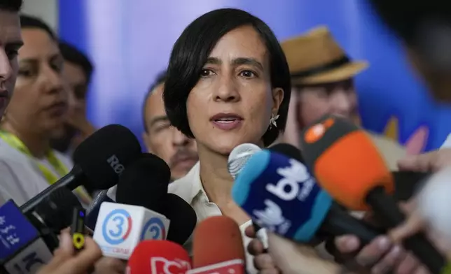 Colombia's Minister of Environment Susana Muhamad talks to the press before the opening ceremony of COP16, a United Nations' biodiversity conference, in Cali, Colombia, Sunday, Oct. 20, 2024. (AP Photo/Fernando Vergara)