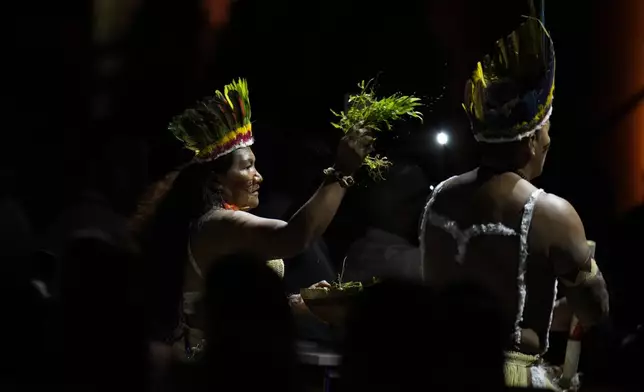 Wayuu Indigenous Colombians perform during the opening ceremony of COP16, a United Nations' biodiversity conference, in Cali, Colombia, Sunday, Oct. 20, 2024. (AP Photo/Fernando Vergara)