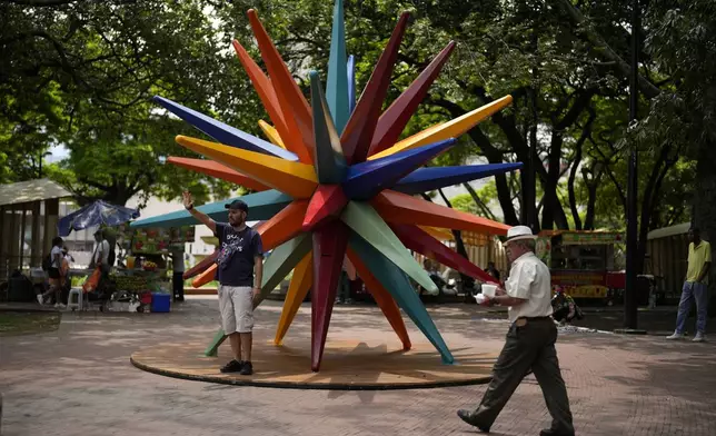 A sculpture adorns the green zone, a day ahead of the COP16 United Nations biodiversity conference, in host city Cali, Colombia, Saturday, Oct. 19, 2024. (AP Photo/Fernando Vergara)