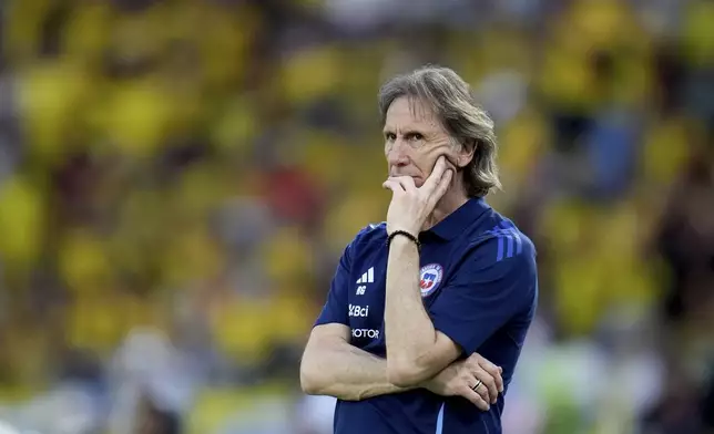 Chile's coach Ricardo Gareca gestures during a FIFA World Cup 2026 qualifying soccer match against Colombia at the Metropolitano Roberto Melendez stadium in Barranquilla, Colombia, Tuesday, Oct. 15, 2024. (AP Photo/Fernando Vergara)