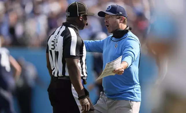 Tennessee Titans head coach Brian Callahan argues a call during the second half of an NFL football game against the Indianapolis Colts, Sunday, Oct. 13, 2024, in Nashville, Tenn. (AP Photo/George Walker IV)