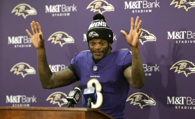 Baltimore Ravens quarterback Lamar Jackson speaks during a news conference following an NFL football game against the Washington Commanders Sunday, Oct. 13, 2024, in Baltimore. (AP Photo/Nick Wass)