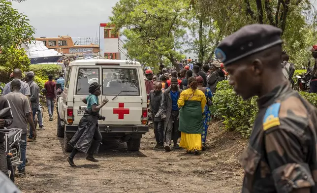 An ambulance arrives at the port of Goma, Democratic Republic of Congo, after a ferry carrying hundreds capsized on arrival Thursday, Oct. 3, 2024. (AP Photo/Moses Sawasawa)