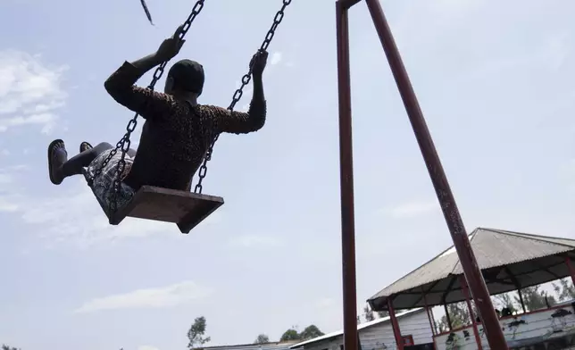 Children, some suffering from traumatic stress caused by the ongoing fighting between government troops and M23 rebels, play in Goma, Democratic Republic of the Congo, Thursday, Aug. 29, 2024. (AP Photo/Moses Sawasawa)