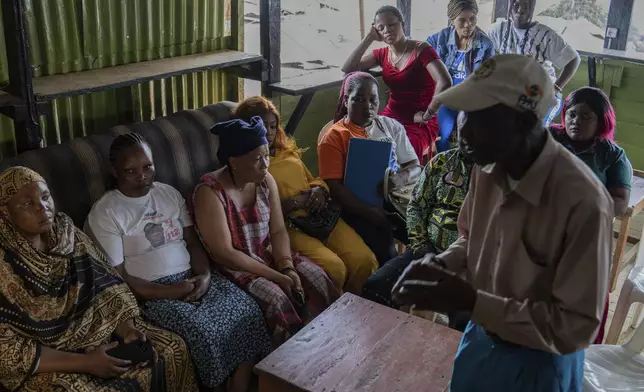 Sex workers participate in an mpox awareness program Wednesday, Sept. 4, 2024 in Kamituga, eastern Congo. (AP Photo/Moses Sawasawa)