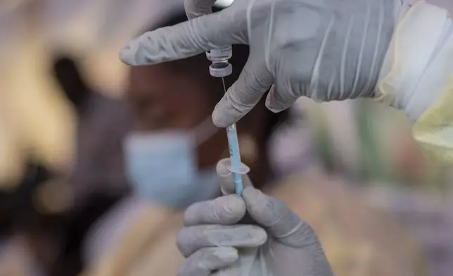 A nurse prepares to administer a vaccine against mpox, at the General hospital, in Goma, Democratic Republic of Congo Saturday, Oct. 5, 2024. (AP Photo/Moses Sawasawa)