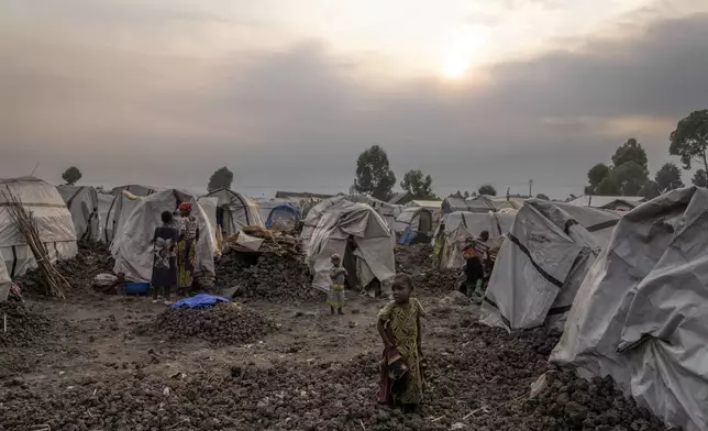 FILE - People displaced by the ongoing fighting gather at refugee camp on the outskirts of Goma, Democratic Republic of the Congo, Thursday, July 11, 2024. (AP Photo/Moses Sawasawa, File)