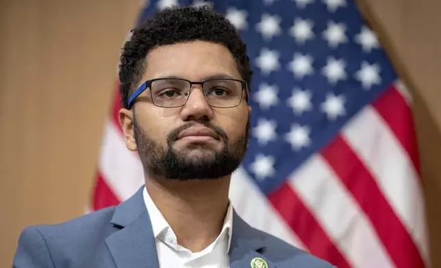 FILE - Rep. Maxwell Frost, D-Fla., listens during a panel discussion in Washington, Jan. 10, 2023. (AP Photo/Amanda Andrade-Rhoades, File)