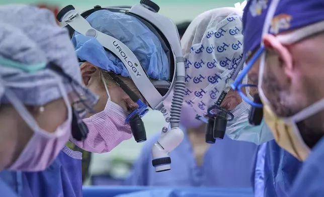 This photo provided by the Children’s Hospital of Philadelphia shows the hospital surgical team separating conjoined twins, Amari and Javar Ruffin, at the Children’s Hospital of Philadelphia, Aug. 21, 2024. (Ed Cunicelli/Children’s Hospital of Philadelphia via AP)