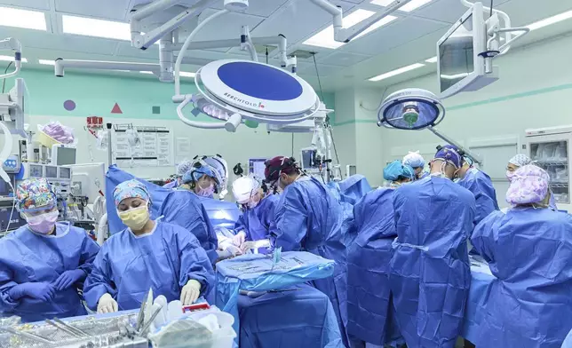 This photo provided by the Children’s Hospital of Philadelphia shows the hospital surgical team separating conjoined twins, Amari and Javar Ruffin, at the Children’s Hospital of Philadelphia, Aug. 21, 2024. (Ed Cunicelli/Children’s Hospital of Philadelphia via AP)