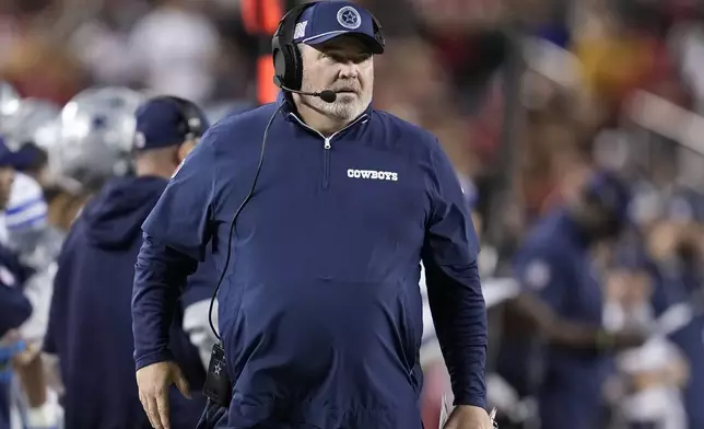 Dallas Cowboys head coach Mike McCarthy watches from the sideline during the first half of an NFL football game against the San Francisco 49ers in Santa Clara, Calif., Sunday, Oct. 27, 2024. (AP Photo/Tony Avelar)