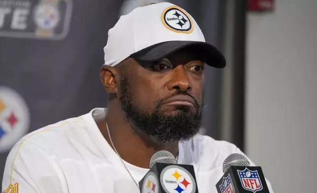 Pittsburgh Steelers head coach Mike Tomlin talks to reporters following an NFL football game against the Dallas Cowboys, early Monday, Oct. 7, 2024, in Pittsburgh. The Cowboys won 20-17. (AP Photo/Gene J. Puskar)