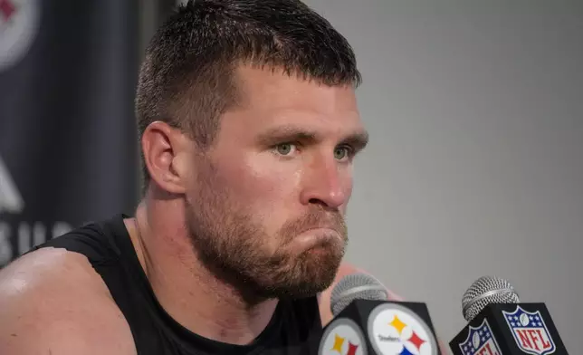 Pittsburgh Steelers linebacker T.J. Watt talks to reporters following an NFL football game against the Dallas Cowboys, early Monday, Oct. 7, 2024, in Pittsburgh. The Cowboys won 20-17. (AP Photo/Gene J. Puskar)