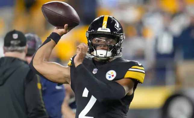 Pittsburgh Steelers quarterback Justin Fields works out prior to an NFL football game against the Dallas Cowboys, Sunday, Oct. 6, 2024, in Pittsburgh. (AP Photo/Gene J. Puskar)