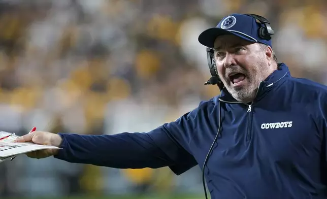 Dallas Cowboys head coach Mike McCarthy reacts during the second half of an NFL football game against the Pittsburgh Steelers, early Monday, Oct. 7, 2024, in Pittsburgh. The Cowboys won 20-17. (AP Photo/Matt Freed)