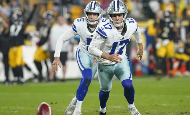 Dallas Cowboys kicker Brandon Aubrey (17) and holder Bryan Anger (5) chase the ball after Aubrey's field goal attempt was blocked by the Pittsburgh Steelers during the second half of an NFL football game, Sunday, Oct. 6, 2024, in Pittsburgh. (AP Photo/Matt Freed)