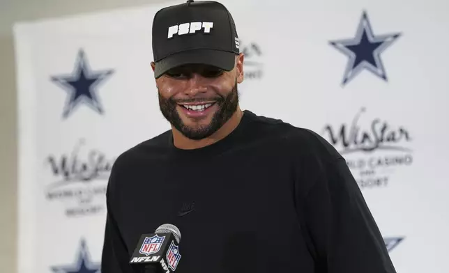 Dallas Cowboys quarterback Dak Prescott talks to reporters following an NFL football game against the Pittsburgh Steelers, early Monday, Oct. 7, 2024, in Pittsburgh. The Cowboys won 20-17. (AP Photo/Matt Freed)