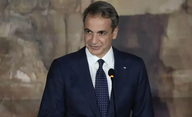 Greece's Prime Minister Kyriakos Mitsotakis, speaks during a news conference in Paphos ,Cyprus, on Friday, Oct 11, 2024 as the leaders of nine southern European Union member countries and Jordan are meeting to come up with ways of de-escalating the conflict in the Middle East (AP Photo/Petros Karadjias)