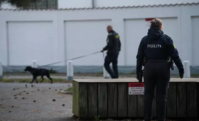 Police investigate explosions near the Israeli embassy in Copenhagen, Denmark, Wednesday, Oct. 2, 2024. (Emil Helms/Ritzau Scanpix via AP)