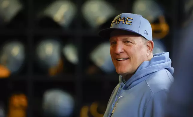 Milwaukee Brewers manager Pat Murphy looks on from the dugout before a baseball game against the Arizona Diamondbacks Friday, Sept. 20, 2024, in Milwaukee. (AP Photo/Jeffrey Phelps)