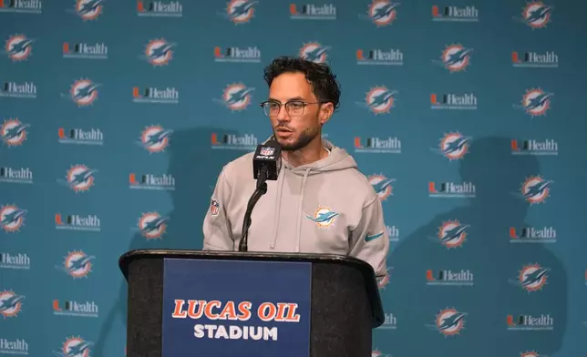 Miami Dolphins head coach Mike McDaniel speaks during a news conference after an NFL football game against the Indianapolis Colts, Sunday, Oct. 20, 2024 in Indianapolis. (AP Photo/Michael Conroy)