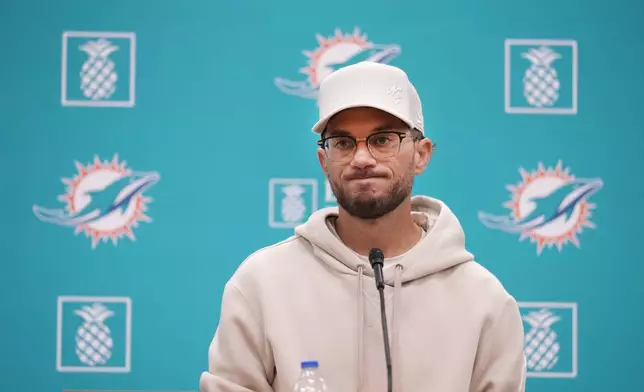 Miami Dolphins head coach Mike McDaniel takes questions during a news conference, Monday, Oct. 21, 2024, at the Dolphins training facility in Miami Gardens, Fla. (AP Photo/Wilfredo Lee)