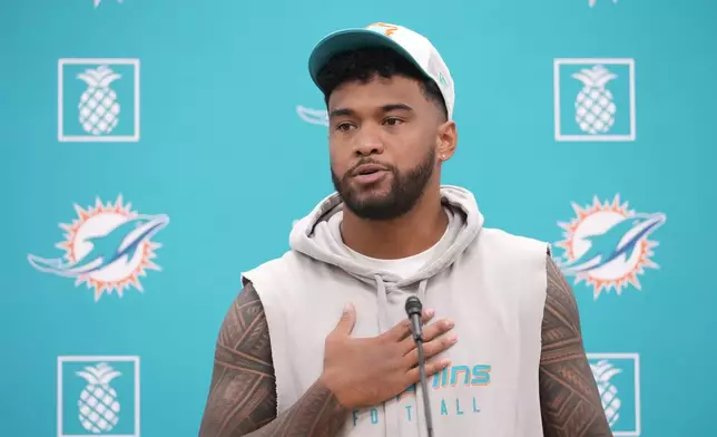 Miami Dolphins quarterback Tua Tagovailoa speaks during an NFL football news conference, Monday, Oct. 21, 2024, at the Dolphins training facility in Miami Gardens, Fla. (AP Photo/Wilfredo Lee)