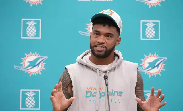 Miami Dolphins quarterback Tua Tagovailoa speaks during an NFL football news conference, Monday, Oct. 21, 2024, at the Dolphins training facility in Miami Gardens, Fla. (AP Photo/Wilfredo Lee)