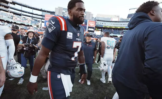 New England Patriots quarterback Jacoby Brissett walks off the field after a 15-10 loss to the Miami Dolphins after an NFL football game, Sunday, Oct. 6, 2024, in Foxborough, Mass. (AP Photo/Michael Dwyer)