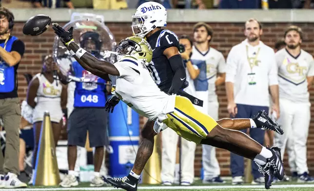 Georgia Tech Yellow Jackets wide receiver Eric Singleton Jr. (2) stretches out for a pass in the first quarter of a football game against the Duke BlueDevils, Saturday, Oct. 5, 2024, in Atlanta. (AP Photo/Jason Allen)