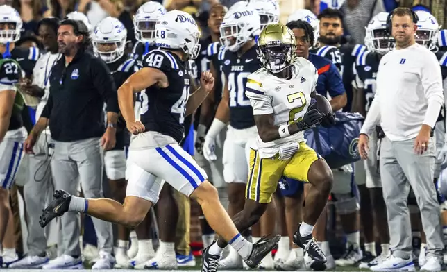 Georgia Tech Yellow Jackets wide receiver Eric Singleton Jr. (2) runs down the sidelines after a punt return in the first quarter of a football game against the Duke BlueDevils, Saturday, Oct. 5, 2024, in Atlanta. (AP Photo/Jason Allen)