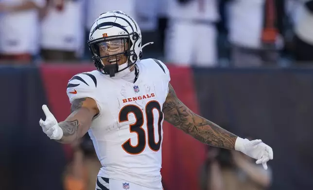 Cincinnati Bengals running back Chase Brown reacts after scoring a touchdown against the Philadelphia Eagles during the second half of an NFL football game, Sunday, Oct. 27, 2024 in Cincinnati. (AP Photo/Carolyn Kaster)