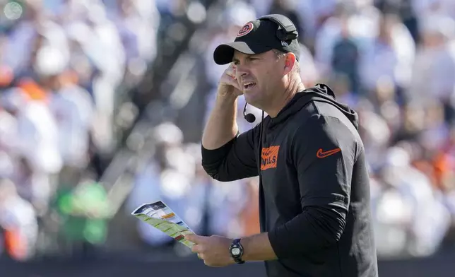 Cincinnati Bengals head coach Zac Taylor looks on during the first half of an NFL football game against the Philadelphia Eagles, Sunday, Oct. 27, 2024 in Cincinnati. (AP Photo/Jeff Dean)