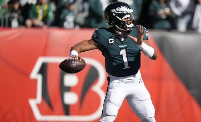 Philadelphia Eagles quarterback Jalen Hurts works out prior to an NFL football game against the Cincinnati Bengals, Sunday, Oct. 27, 2024 in Cincinnati. (AP Photo/Carolyn Kaster)