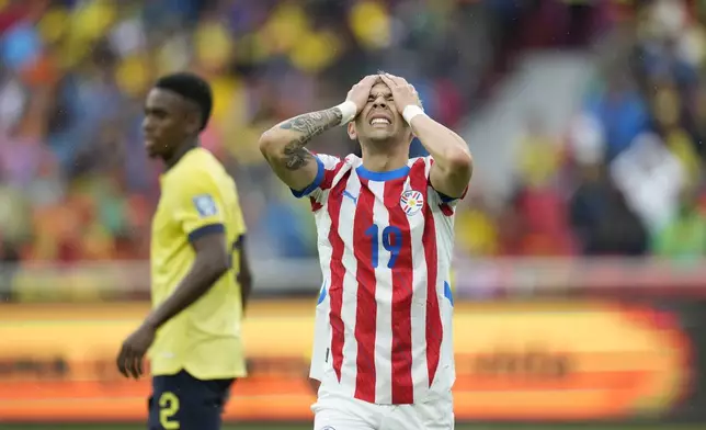 Paraguay's Julio Enciso gestures during a qualifying soccer match for the FIFA World Cup 2026 against Ecuador at Rodrigo Paz Delgado stadium in Quito, Ecuador, Thursday, Oct. 10, 2024. (AP Photo/Dolores Ochoa)