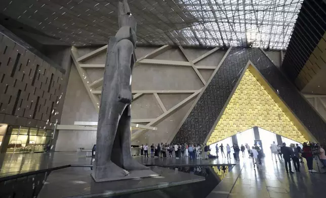 King Ramses II statue is displayed at the Grand Egyptian Museum in Giza, Egypt, Tuesday, Oct.15, 2024. (AP Photo/Khaled Elfiqi)