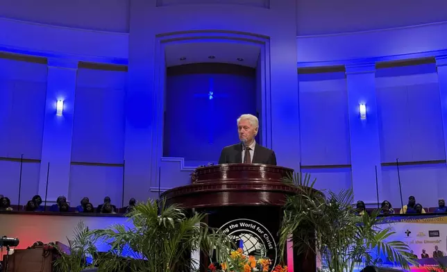 Former President Bill Clinton speaks at Mt. Zion Baptist Church in Albany, Ga. on Sunday, Oct. 13, 2024. (AP Photo/Charlotte Kramon)