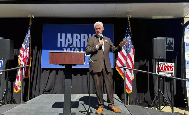 Former President Bill Clinton speaks at a canvassing launch for Vice President Kamala Harris' campaign in Albany, Ga. on Sunday, Oct. 13, 2024. (AP Photo/Charlotte Kramon)