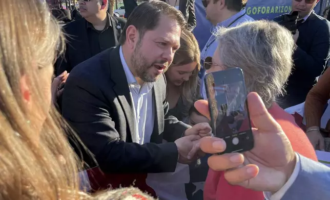 FILE - Democrat Ruben Gallego greets supporters at one of the first events of his 2024 Senate campaign in Phoenix, Jan. 28, 2023. (AP Photo/Jonathan J. Cooper, File)