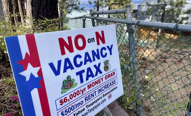 A "No on Measure N" sign sits in front of a home in South Lake Tahoe, Calif. on Thursday, Oct. 17, 2024, where voters will decide whether to approve Measure N, which will mandate a tax to homeowners who leave their homes vacant for more than half the year. (AP Photo/Haven Daley)