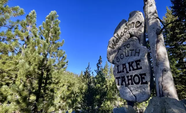 A sign welcomes motorists to South Lake Tahoe, Calif. on Friday, Oct. 18, 2024, where voters will decide whether to approve Measure N, which will mandate a tax to homeowners who leave their homes vacant for more than half the year. (AP Photo/Haven Daley)