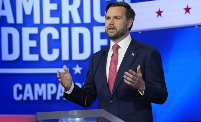 Republican vice presidential nominee Sen. JD Vance, R-Ohio, speaks during a vice presidential debate hosted by CBS News, with Democratic vice presidential candidate Minnesota Gov. Tim Walz, Tuesday, Oct. 1, 2024, in New York. (AP Photo/Matt Rourke)