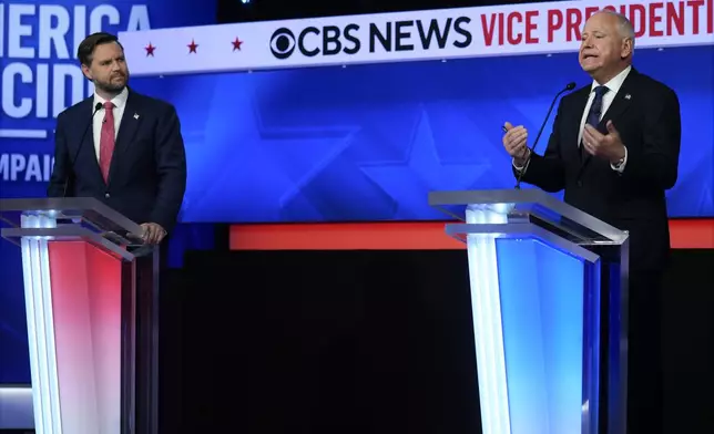 Democratic vice presidential nominee Minnesota Gov. Tim Walz speaks during a vice presidential debate hosted by CBS News, with Republican vice presidential nominee Sen. JD Vance, R-Ohio, Tuesday, Oct. 1, 2024, in New York. (AP Photo/Matt Rourke)