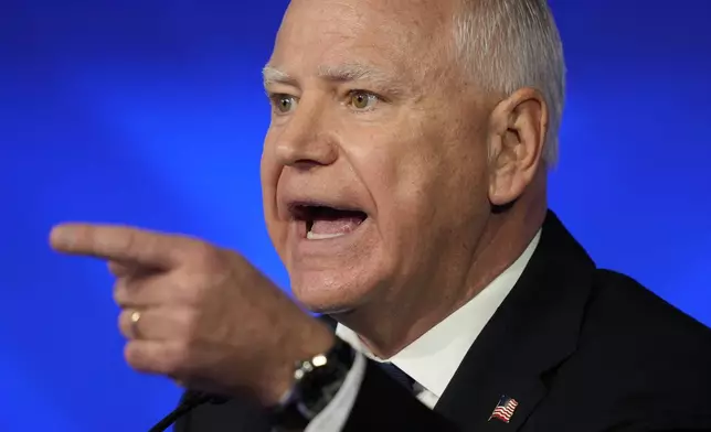 Democratic vice presidential nominee Minnesota Gov. Tim Walz speaks during a vice presidential debate hosted by CBS News, with Republican vice presidential nominee Sen. JD Vance, R-Ohio, Tuesday, Oct. 1, 2024, in New York. (AP Photo/Matt Rourke)